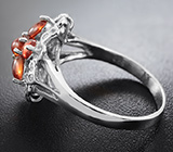 Изящное серебряное кольцо со спессартинами Серебро 925