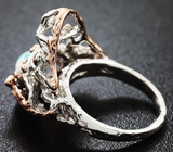 Серебряное кольцо с эфиопским опалом и родолитами Серебро 925