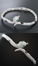 Серебряный комплект «Змейки» с изумрудами и черной эмалью Серебро 925