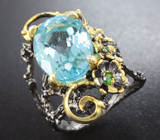 Серебряное кольцо с голубым топазом и диопсидами Серебро 925