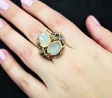 Серебряное кольцо с лунным камнем с «кошачьим глазом» и пурпурными сапфирами