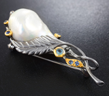 Серебряная брошь с жемчужиной барокко, голубым топазом и синими сапфирами Серебро 925
