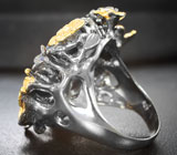 Серебряное кольцо cо звездчатым сапфиром 43,53 карата и танзанитами Серебро 925