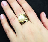 Серебряное кольцо с жемчужиной барокко и мозамбикскими гранатами