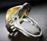 Серебряное кольцо с лимонным цитрином 18,1 карата и синими сапфирами