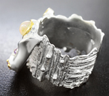 Серебряное кольцо с кристаллическим эфиопским опалом, аметистами и голубыми топазами
