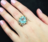 Серебряное кольцо с голубым топазом 14,35 карата и синими сапфирами