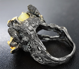 Серебряное кольцо с желтым опалом, изумрудом и мозамбикскими гранатами Серебро 925