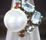 Серебряное кольцо с жемчужиной, голубыми топазами и мозамбикскими гранатами