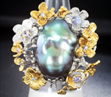 Серебряное кольцо с цветной жемчужиной барокко 38,5 карата и танзанитами Серебро 925