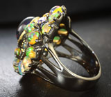 Серебряное кольцо с кристаллическими эфиопскими опалами, аметистами и голубыми топазами