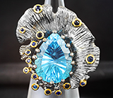 Серебряное кольцо с голубым топазом лазерной огранки 15,92 карата и синими сапфирами