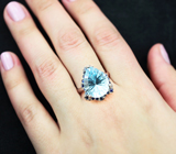 Серебряное кольцо с голубым топазом лазерной огранки 9,2 карата и синими сапфирами Серебро 925