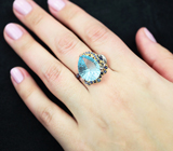 Серебряное кольцо с голубым топазом лазерной огранки 9,51 карата и синими сапфирами