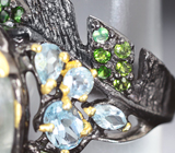 Серебряное кольцо с аквамарином, голубыми топазами, перидотами и диопсидами Серебро 925