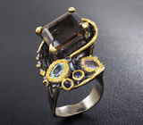 Серебряное кольцо с дымчатым кварцем, аметистом, голубым топазом и синими сапфирами