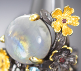 Серебряное кольцо с лунным камнем, голубыми топазами и родолитами  Серебро 925