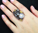 Серебряное кольцо с лунным камнем, голубыми топазами и родолитами  Серебро 925