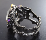 Серебряное кольцо с бесцветным кварцем, аметистами и родолитами Серебро 925