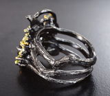 Серебряное кольцо с ограненным опалом, перидотами и бериллами