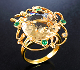 Золотое кольцо с редким гелиодором авторской огранки 13,24 карата, уральскими изумрудами и бриллиантами Золото