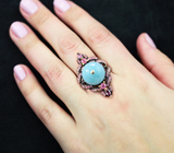 Серебряное кольцо cо сферой аквамарина, розовыми сапфирами и родолитами