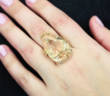 Массивное золотое кольцо с крупным персиковым морганитом 34,97 карата и бриллиантами Золото