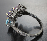 Серебряное кольцо с голубыми топазами, аметистами и родолитами Серебро 925