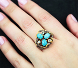 Серебряное кольцо с бирюзой 2,3 карата и голубыми топазами
