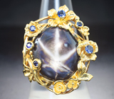 Массивное золотое кольцо с крупным звездчатым 27,59 карата и синими сапфирами Золото