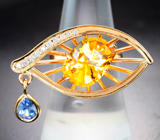 Золотое кольцо с ярким гелиодором авторской огранки 4,61 карата, синим сапфиром и бриллиантами высоких характеристик Золото