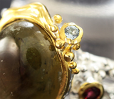 Серебряное кольцо c звездчатым сапфиром, родолитами гранатами и голубым топазом