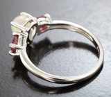 Эффектное серебряное кольцо с кристаллическим эфиопским опалом и рубинами Серебро 925