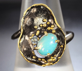 Серебряное кольцо с кристаллическим эфиопским опалом и бесцветным топазом
