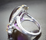 Серебряное кольцо с аметистом 19,32 карата, голубыми топазами, малым аметистом  и апатитами Серебро 925