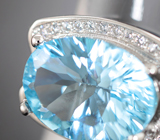 Превосходное серебряное кольцо с голубым топазом лазерной огранки