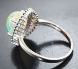 Серебряное кольцо с кристаллическим эфиопским опалом и черными шпинелями