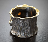 Серебряное кольцо с кристаллическими эфиопскими опалами, голубым топазом и перидотом