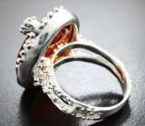 Серебряное кольцо с карнелианом 20,29 карата и голубым топазом