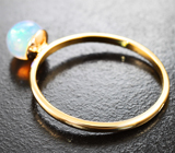 Золотое кольцо с cо сферой полупрозрачного кристаллического эфиопского опала 1,2 карата