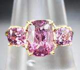 Золотое кольцо с крупными пурпурно-розовыми шпинелями 4,48 карата