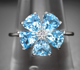 Замечательное серебряное кольцо с голубыми топазами