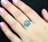 Замечательное серебряное кольцо с голубыми топазами