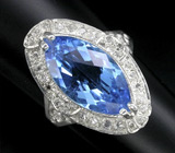 Кольцо с ярко-голубым топазом эффектной огранки Серебро 925