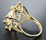 Золотое кольцо с ограненным эфиопским опалом 1,95 карата, рубинами, цаворитами и бриллиантами Золото
