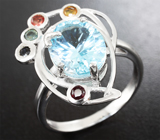 Серебряное кольцо с голубым топазом и разноцветными сапфирами