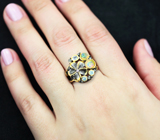 Серебряное кольцо с кристаллическими эфиопскими опалами, танзанитом и голубыми топазами